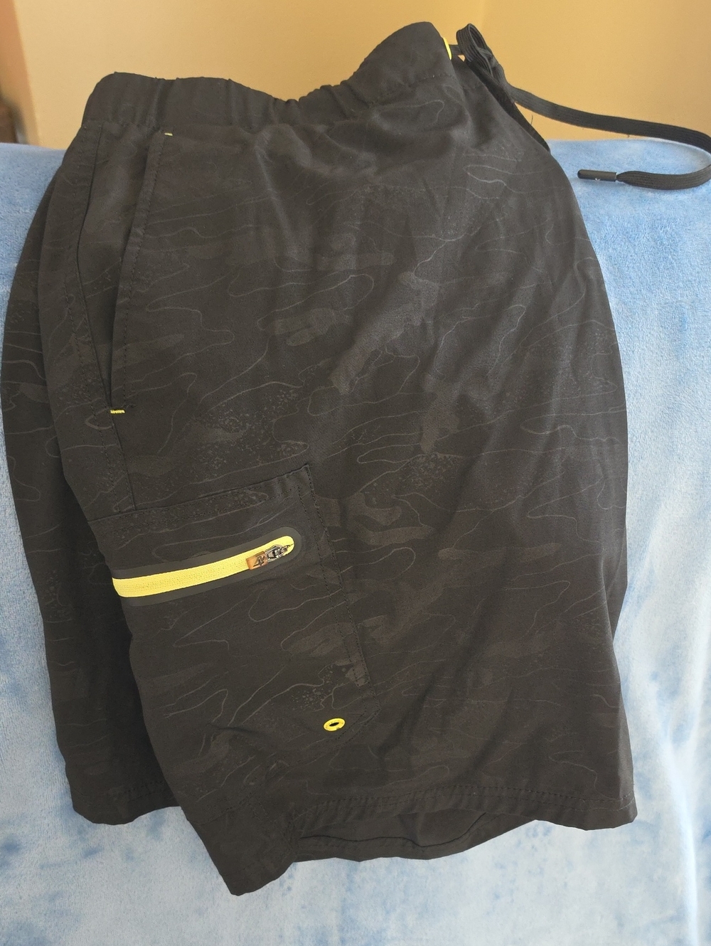 ZeroXposur Black Athletic Shorts with Yellow Zip Accents